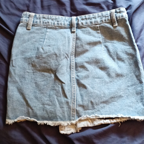 Forever 21 Denim distressed blue jean mini skirt. Button up with fringes. S - Picture 3 of 3